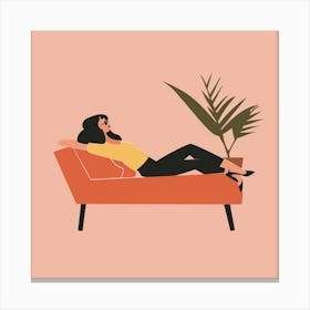 Woman Relaxing On Couch Canvas Print