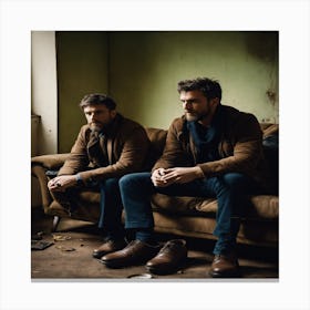 Two Men Sitting On A Couch Canvas Print