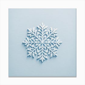 "Serene Snowflake Elegance"  A meticulously crafted paper snowflake adorns a soft blue background, offering a close-up view of its symmetrical design and intricate patterns. The art captures the transient and delicate essence of a winter's snowflake, translated into a permanent and enchanting piece.  Embrace the tranquility of a winter's day with this serene art, a testament to nature's perfection in design, inviting a sense of calm and contemplation into any space. Canvas Print