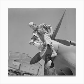 Repair Man Perched Upon Propeller Hub Of Airplane, Lake Muroc, California By Russell Lee Canvas Print
