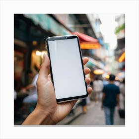 Hand Holding Smartphone In The Street Canvas Print