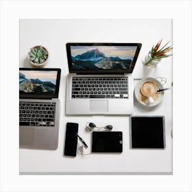 A collection of modern and stylish technology devices, such as laptops, smartphones, and tablets, arranged in a sleek and organized workspace. These images are commonly used in marketing, technology, and business-related projects to convey innovation and professionalism Canvas Print