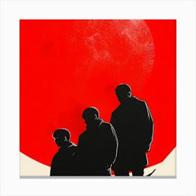 Three Men Standing In Front Of A Red Moon Canvas Print