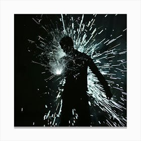 Silhouette Of A Man With A Spark Canvas Print