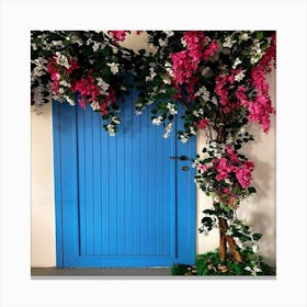 Blue Door With Flowers Canvas Print