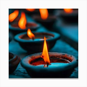 Lit Candles On A Table Canvas Print