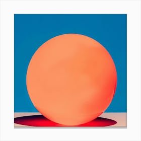 Orange Ball On A Table Canvas Print