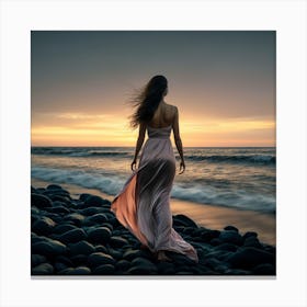 Woman Walking On The Beach At Sunset Canvas Print