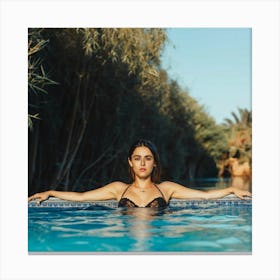 Woman Relaxing In A Swimming Pool Canvas Print