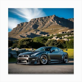 A Sleek Charcoal Grey Nissan GTR With Full Body Kit In Front Of Beautiful Mountain 3 Canvas Print