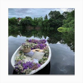 Flowers In A Boat Canvas Print