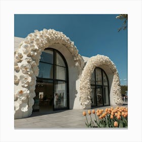 a popup store building from future made of concrete, glass and a lot of teddy bears. The structure is the shaped like an arch with a large circular concrete staircase inside. on the facade there are a lot of soft beige bears. In front there is "THE PTASHATKO" written on it. the weather is sunny outside, the sky is blue. The photography is in the style of street photography and architectural magazine photography. Outside we see big white flowers and more tulip petals covering all around the space. 2 Canvas Print