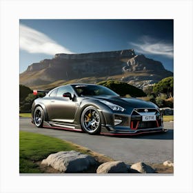 A Sleek Charcoal Grey Nissan GTR With Full Body Kit In Front Of Beautiful Mountain 2 Canvas Print