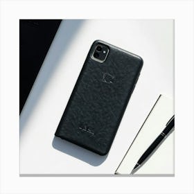 Leather Phone Case With A Textured Finish And Embossed Logo Matte Black Laid Beside An Open Notebo Canvas Print