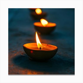 Lit Candles In A Row Canvas Print