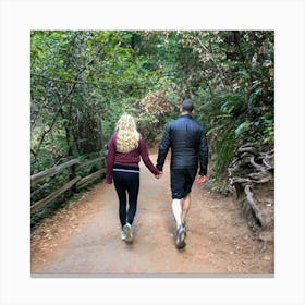 Couple Walking Down A Trail Canvas Print