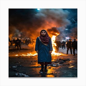 Woman Stands In Front Of A Fire Canvas Print
