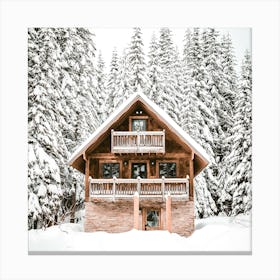 Cabin In The Snowy Pine Woods Canvas Print