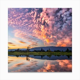 Sunrise Reflected In A Lake Canvas Print
