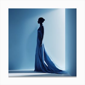 Silhouette Of A Woman In A Blue Dress Canvas Print