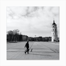 Black And White Photo Of A Man Walking Canvas Print