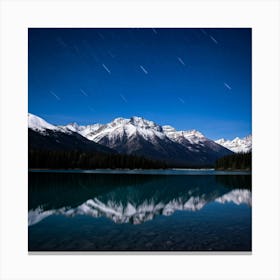 Snow Capped Mountains Bathed In Moonlight Throw Their Reflection On The Star Bedecked Lake Thats La Canvas Print