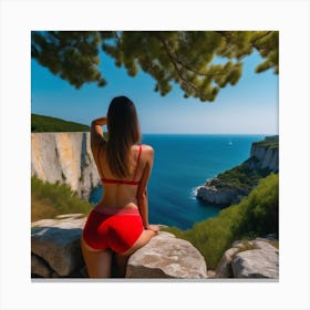 Woman In A Red Bikini Sitting On A Cliff Canvas Print