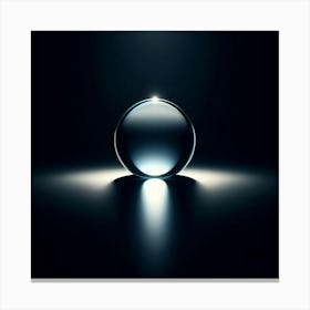 A Glass Ball Sitting in a Dark Void with a Single Light Source Creating a Bright Reflection Canvas Print