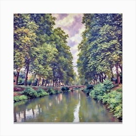 Canal de Brienne Toulouse France. This image depicts a serene riverside scene with a calm river flowing through the center, flanked by lush green trees on both sides. A quaint stone bridge arches over the river in the distance, adding a picturesque element to the tranquil setting. The sky above is partly cloudy, casting a soft light over the landscape, enhancing the peaceful ambiance. Canvas Print