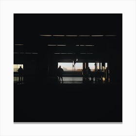 Silhouette Of People In A Train Station Canvas Print