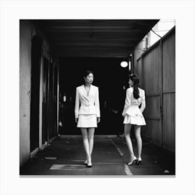 Two Women In White Suits Canvas Print