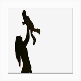 Silhouette Of A Woman Holding A Child Canvas Print