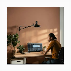 A Photo Of A Person Sitting At A Desk With A Compu (3) Canvas Print