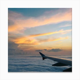 Airplane Wing Over Clouds Canvas Print
