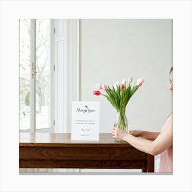 A Minimal And Decorated Nature Inspired Invitation Card A Woman In A Pastel Pink Top Is Gently Layi (7) Canvas Print