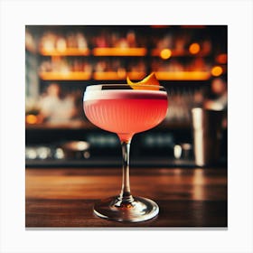 A beautiful, refreshing, and delicious pink cocktail with an orange twist, sitting on a bar, ready to be enjoyed. 1 Canvas Print