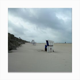 Cloudy beach walk Canvas Print