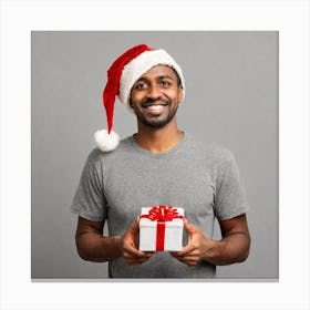 Happy African American Man With Christmas Gift Canvas Print