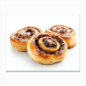 Three Cinnamon Rolls On A White Background Canvas Print