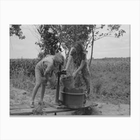 Pumping Water Near Muskogee, Oklahoma, Daughters Of Farmer About To Migrate To California By Russell Lee Canvas Print