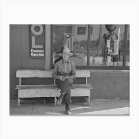 Man Sitting In Front Of Store, Craigville, Minnesota By Russell Lee Canvas Print