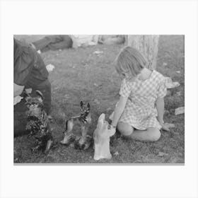 Untitled Photo, Possibly Related To Little Girl Plays With Prizes Won At Concession, Fourth Of July, Vale, Oregon By Russell Canvas Print