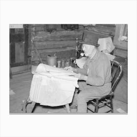 William Besson, Iron Ore Prospector, Examining Geological Survey Maps In His Cabin Near Winton, Minnesota By Russ Canvas Print