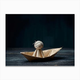 Doll With A Sad Expression Crafted From Delicate Paper Sitting Inside A Small Handmade Paper Boat Canvas Print