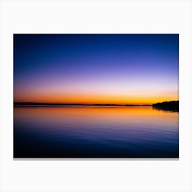 Tranquil Water Reflects Twilights Serene Glow Gentle Hues Of Orange And Purple Dancing On The Surf Canvas Print