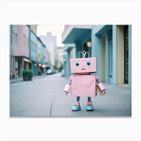 A Pink Cardboard Robot With Blue Shoes Is Standing On A City Street Canvas Print