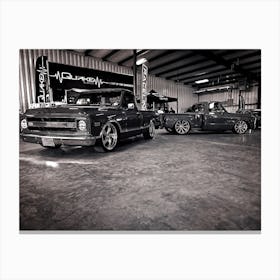 Black And White Image Of Two Trucks Canvas Print