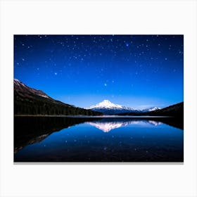 Snowy Peak Of A Mountain Range Mirrored Perfectly On The Serene Surface Of A Star Lit Lake Midnight Canvas Print