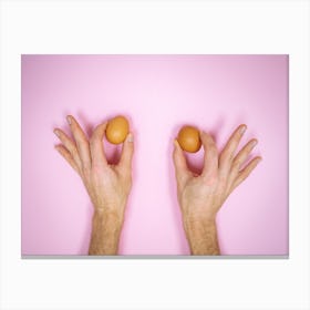 Two Hands Holding Two Eggs Canvas Print