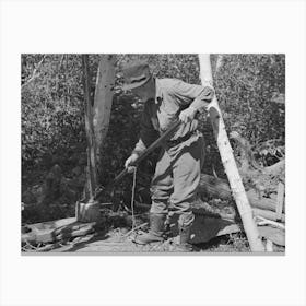 William Besson Removing The Iron Pipe Drill From Casing Near Winton, Minnesota By Russell Lee Canvas Print